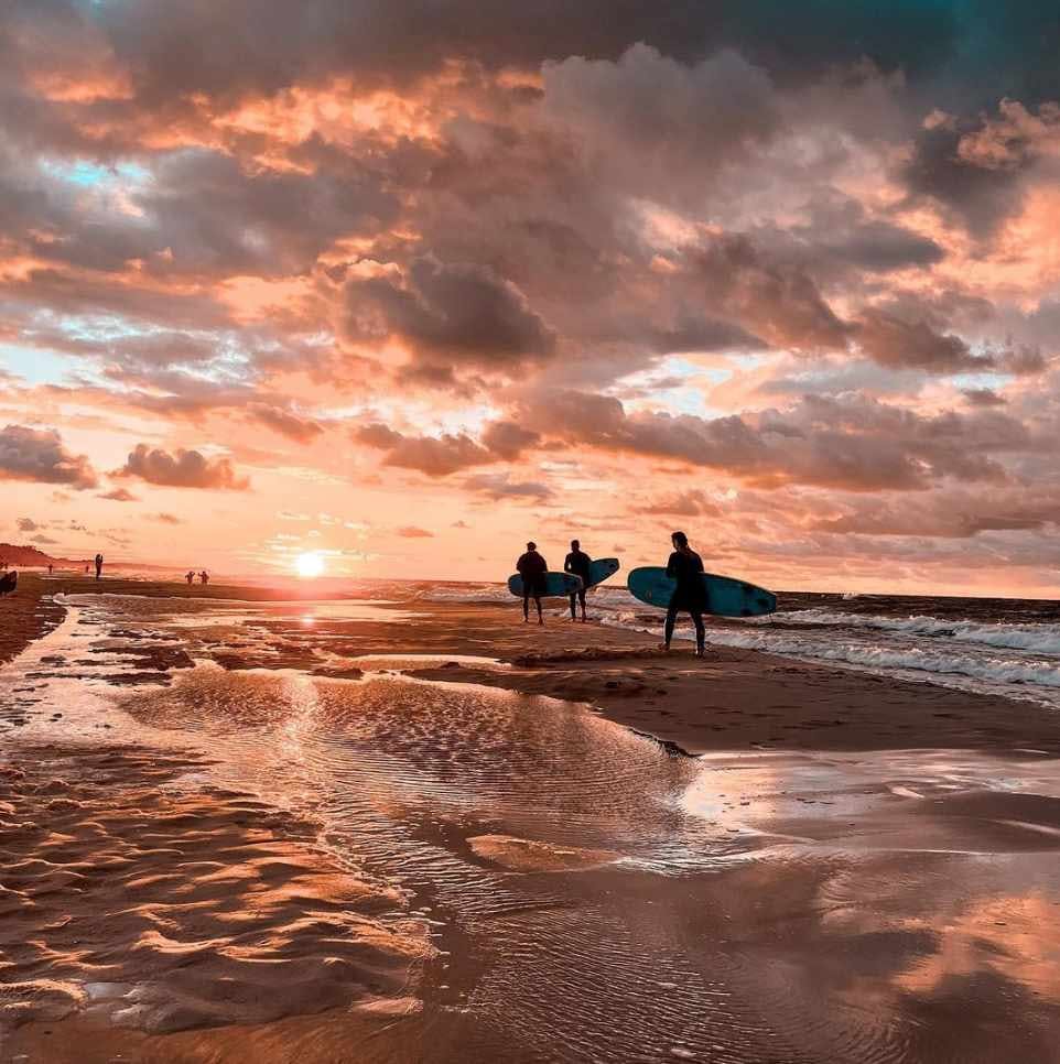 surfers sunset